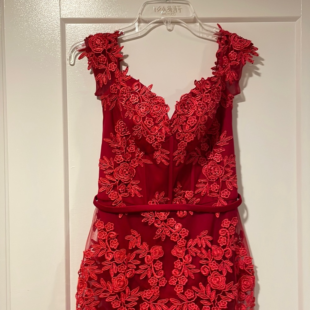 Stunning off the shoulder and backless dress perfect for a wedding or a prom